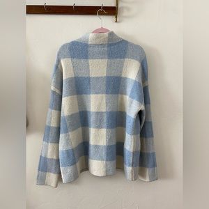Blue and white check sweater